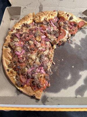 5 meat pizza- Top part of the crust is puffy and the bottom part is thin plus raw bacon.