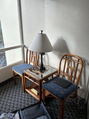 Small seating area in one bedroom Palm Suite.