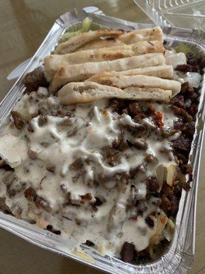 Lamb over rice with white sauce