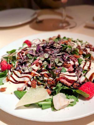 Arugula salad, sliced seared duck breast, lychee, raspberry, crispy duck chicharrones, idiazabal cheese, balsamic vinaigrette