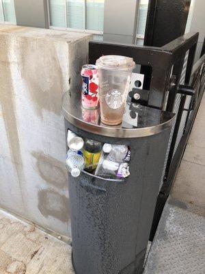 Resident parking deck, third floor, during a holiday weekend. Come on neighbors, you all have trash cans in your units. This is so lazy.