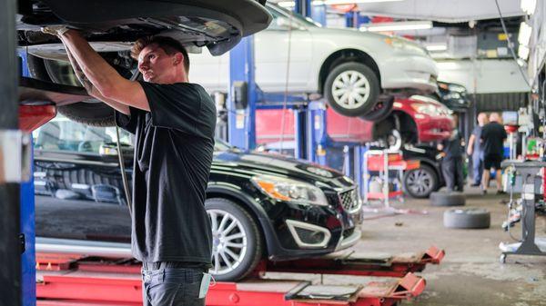 Our newest technician hire Steve working on an oil change.