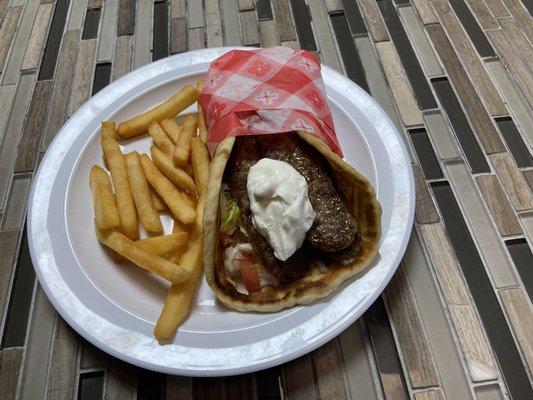 Gyro Sandwich with french fries.