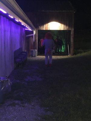 Entrance of the haunted house where characters might greet you.