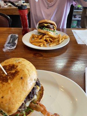 Hog burger (across table),  bodacious burger (closest).