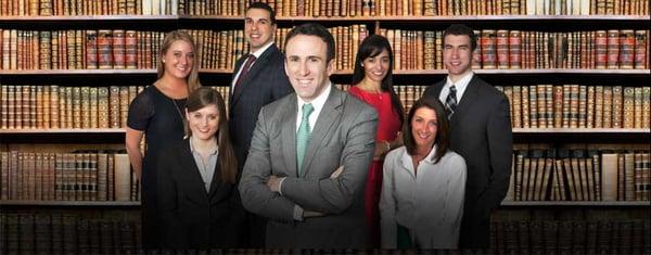 Attorney Mark Sherman (front center) with his experienced team of Attorneys and Paralegals.