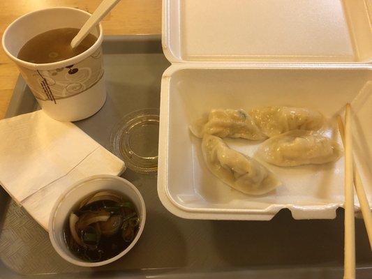 Veggie steamed dumplings (3 eaten) and miso while I wait for our to-go order. Delish!!!