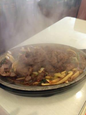 Mongolian Beef still sizzling