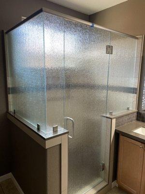 Master bathroom shower with glass installed.