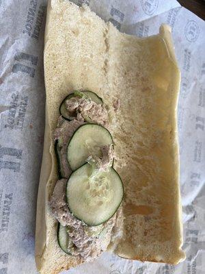 A crappy tuna sandwich that the manager says is how they make it.