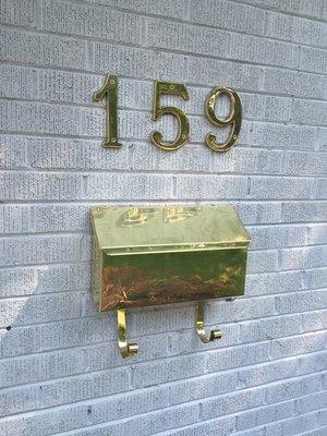 Refinished house numbers and a mailbox