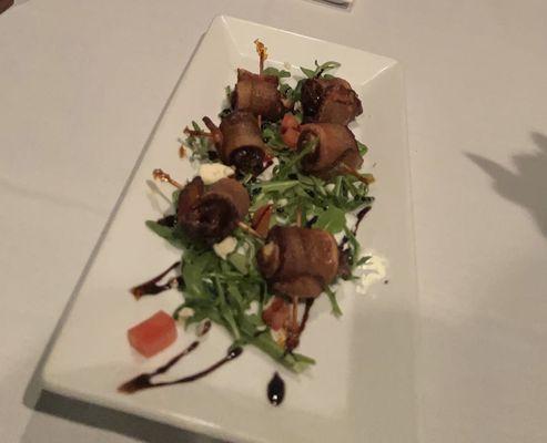 Devils on horseback - dates stuffed with blue cheese wrapped in bacon