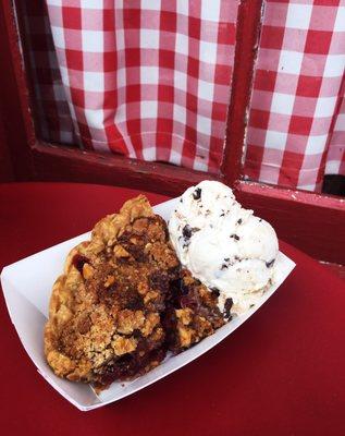 Cherry walnut crumble made a la mode with house made mint chip ice cream