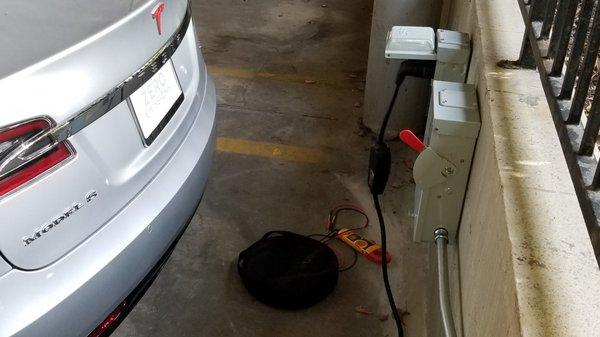 #Tesla #HuntingtonBeach Charging station installed in parking garage.