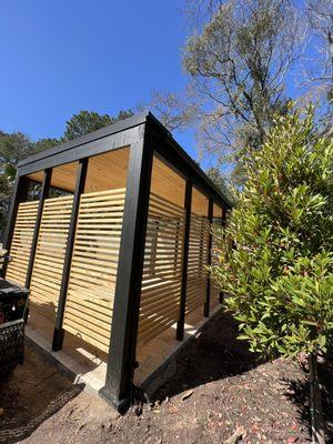 Modern patio with three sided privacy walls.