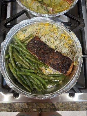 Blackened salmon, sweet corn rice pilaf, sautéed green beans