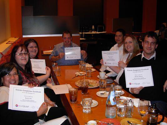 Spanish students celebrating the successful completion of one of our Spanish courses.