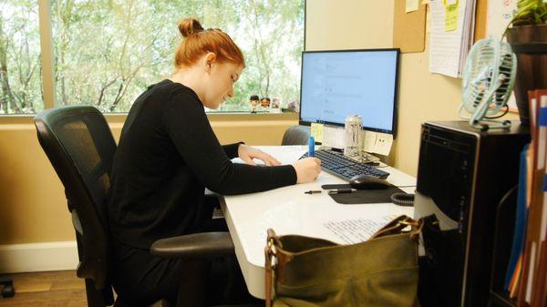 Patient Floor Coordinator planning her day.