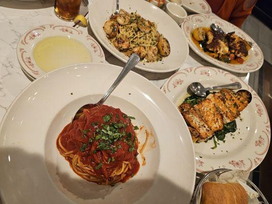 Spaghetti with marinara, salmon, shrimp scampi, and cod