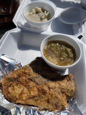 Fried pork chop plate with mashed potatoes and gravy and 1 side of your choice. I got cabbage