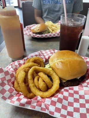 Double cheeseburger with an order of hot, delicious onion rings and a sweet tea.