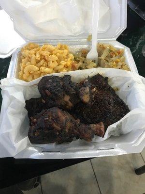 Jerk chicken. Mac-n-cheese and cabbage