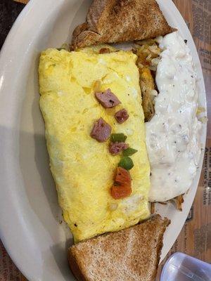 Western omelette with smothered hashbrowns.