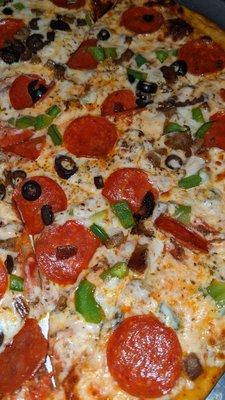 Pizza $2 meat toppings, $1.50 veggie toppings