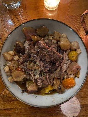 Lamb on grits with roasted root vegetables