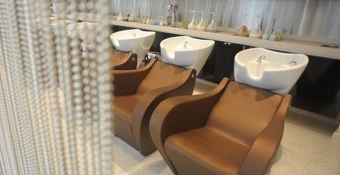 The color stations at Asha SalonSpa in Butterfield are fully stocked with the best Aveda products and plush, comfortable seating.