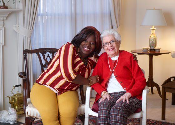 Our client Mrs. Brown and her Comfort Keeper (caregiver) Marvilin.