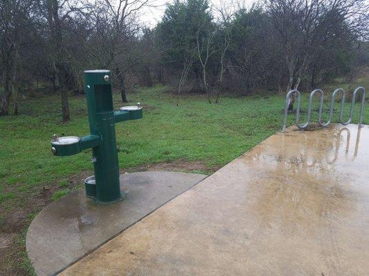 Filtered water to refill your bottle and a dog water bowl on the backside of it. Bike racks too.