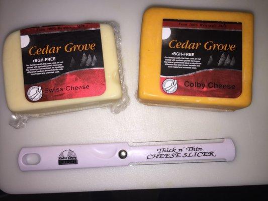 My favorite two kinds of cheese and a very clever wire cheese slicer from Cedar Grove.