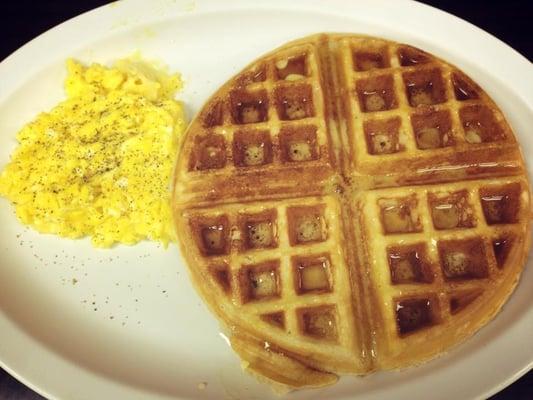 Belgian waffle with two eggs scrambled. Yummy!