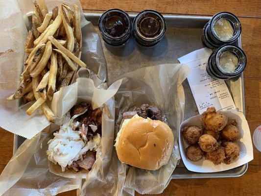 LoLo's Pulled Pork with Slaw, Beef Brisket sandwich, fries & Hush Puppies