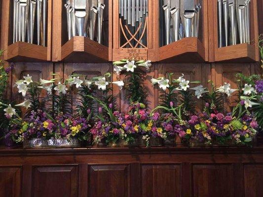 Easter lilies surround the organ