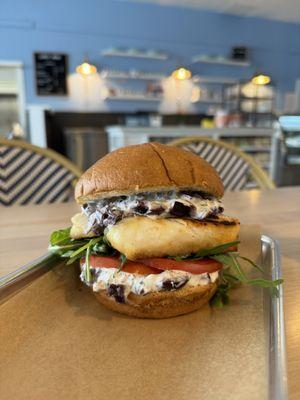 Grilled Mahi Mahi with Black Olive Mayo, Arugula & Tomato with Vinaigrette.  Lunch menu changes twice a month