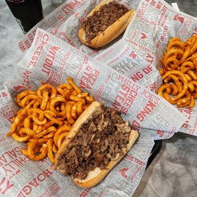 King of Philly cheese steak and curly fries!