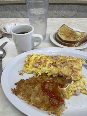 Ham and Cheese Omelette w/ Hashbrowns, Rye buttered toast and Coffee