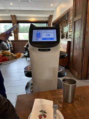 Robot delivering food in the restaurant