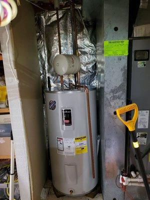 New  water heater with expansion tank.