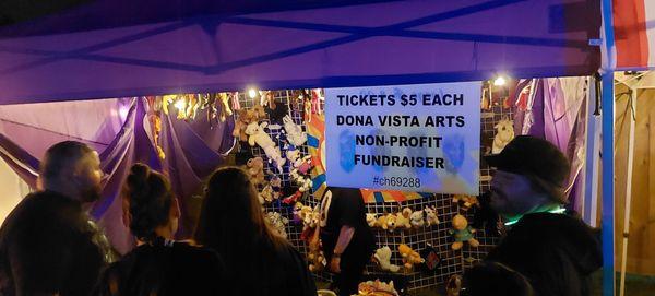 Ticket area for Non-profit fundraiser. Tickets are $5 each and provides access to on-site games like ax throwing