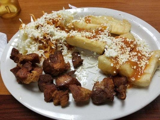 Yuca con chicharrón.... unfortunately in Honduras no one serves it like this. 100% fail