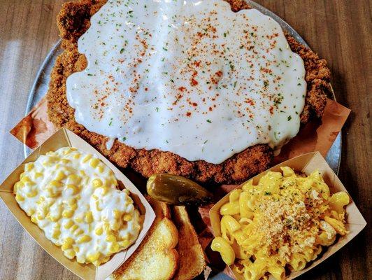 Chicken fried steak, creamed corn and chicharron mac and cheese