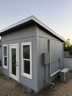 12k BTU 1-zone 21 SEER wall mounted Mitsubishi mini split AC and heat pump system installed for the shed in Laguna Hills