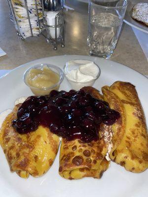 cheese blintzes with blueberry topping