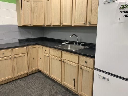 Stained, dirty, broken cabinets in party room