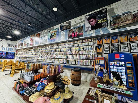 Wall of past winning tickets (+ views of old scratch off marketing posters, souvenirs, & a few Texas Lottery award plaques, as well)