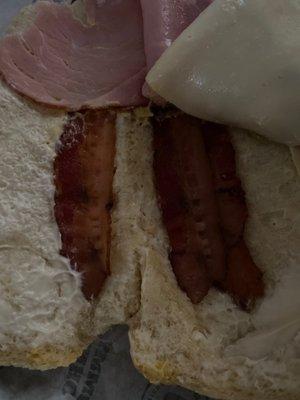 the bacon be lined up like this so in the inside crease of my sandwich it's a bacon fiesta but on the outside there's none at all