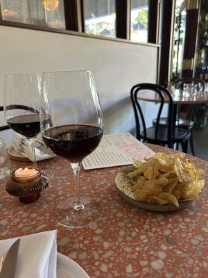 Gamay in front, Syrah in back, and the camembert with potato chips